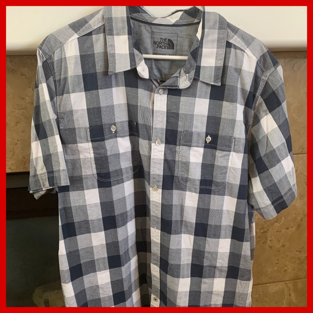 The North Face black/grey/white button down shirt.